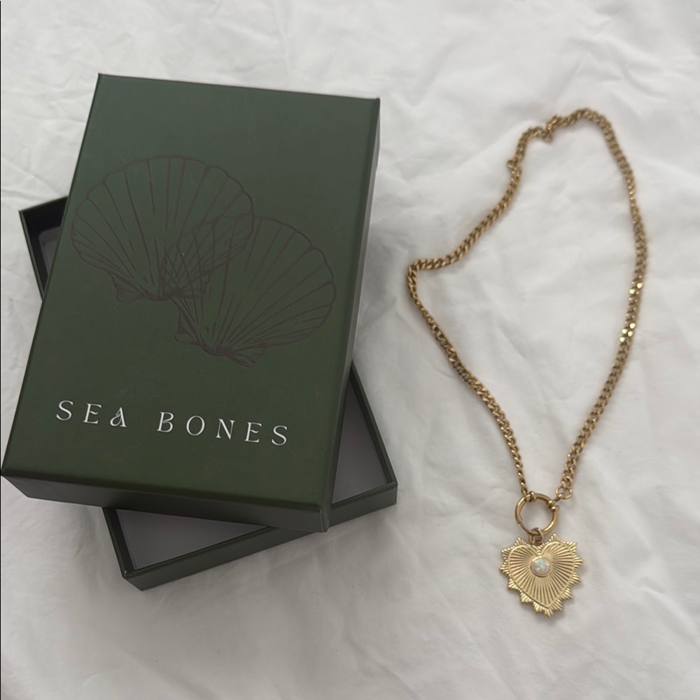 Gold Necklace with Ornate Medallion Pendant